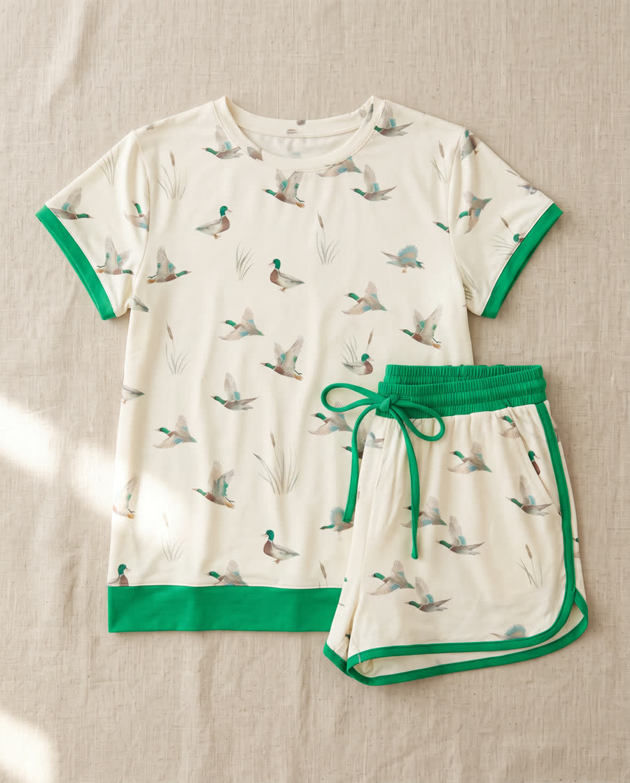 Cream duck-print tee and shorts with green colourblock trim